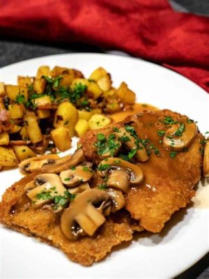  Jägerschnitzel: Ein knuspriges Schnitzel-Abenteuer mit cremiger Pilzsauce und saftigem Kartoffelpüree!